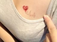 女生胸部简单的心电图纹身